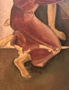 Afbeelding van het restauratieproces van een geglazuurd tegelpaneel.